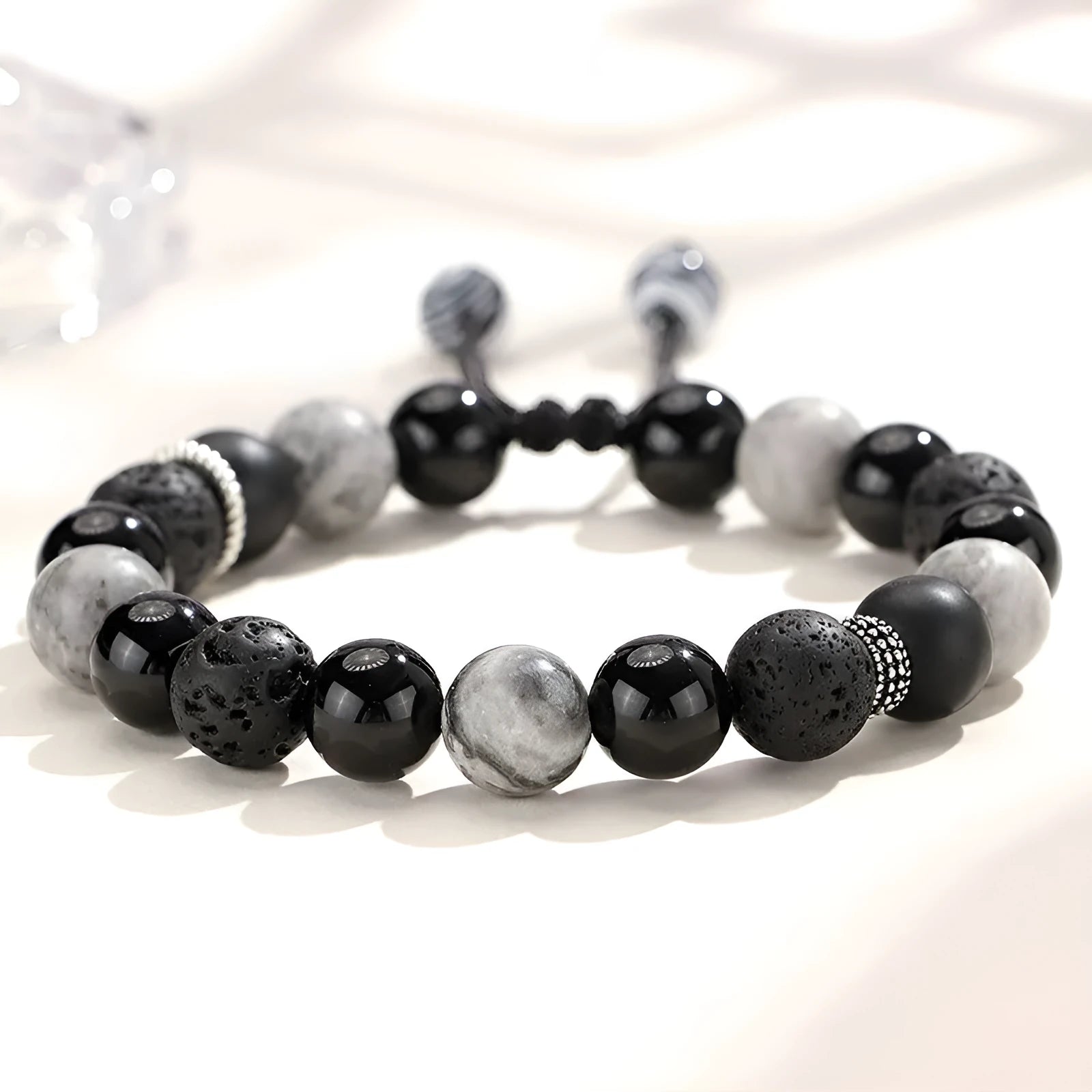 Black agate map stone volcanic rock bracelet with diamond-shaped stones and electroplated finish