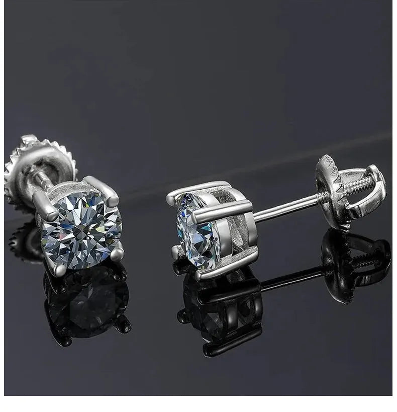 Silver geometric screw back moissanite stud earrings with four-claw setting on a black card.