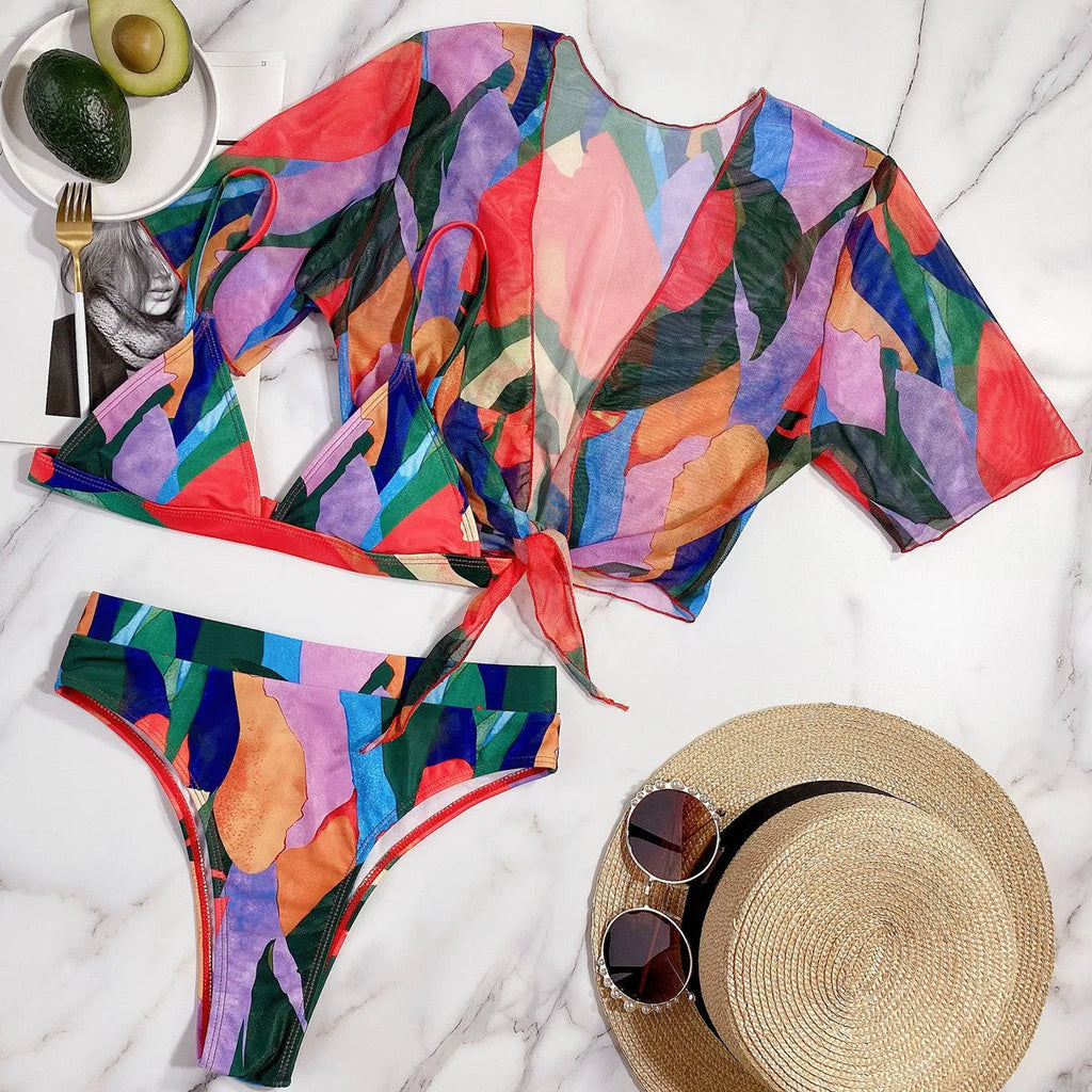 Red women's split swimsuit with printed design for swimming and water sports