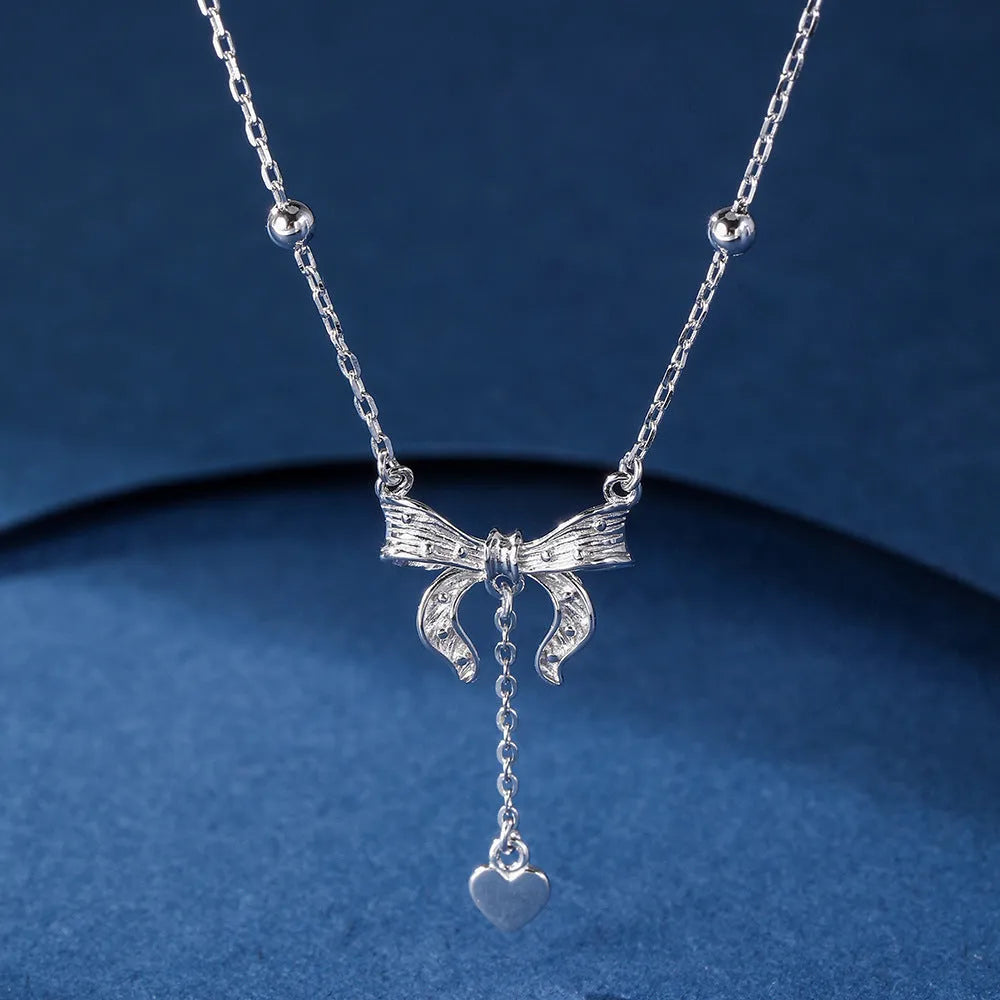 S925 silver butterfly heart necklace with adjustable O-ring chain and bow detailing
