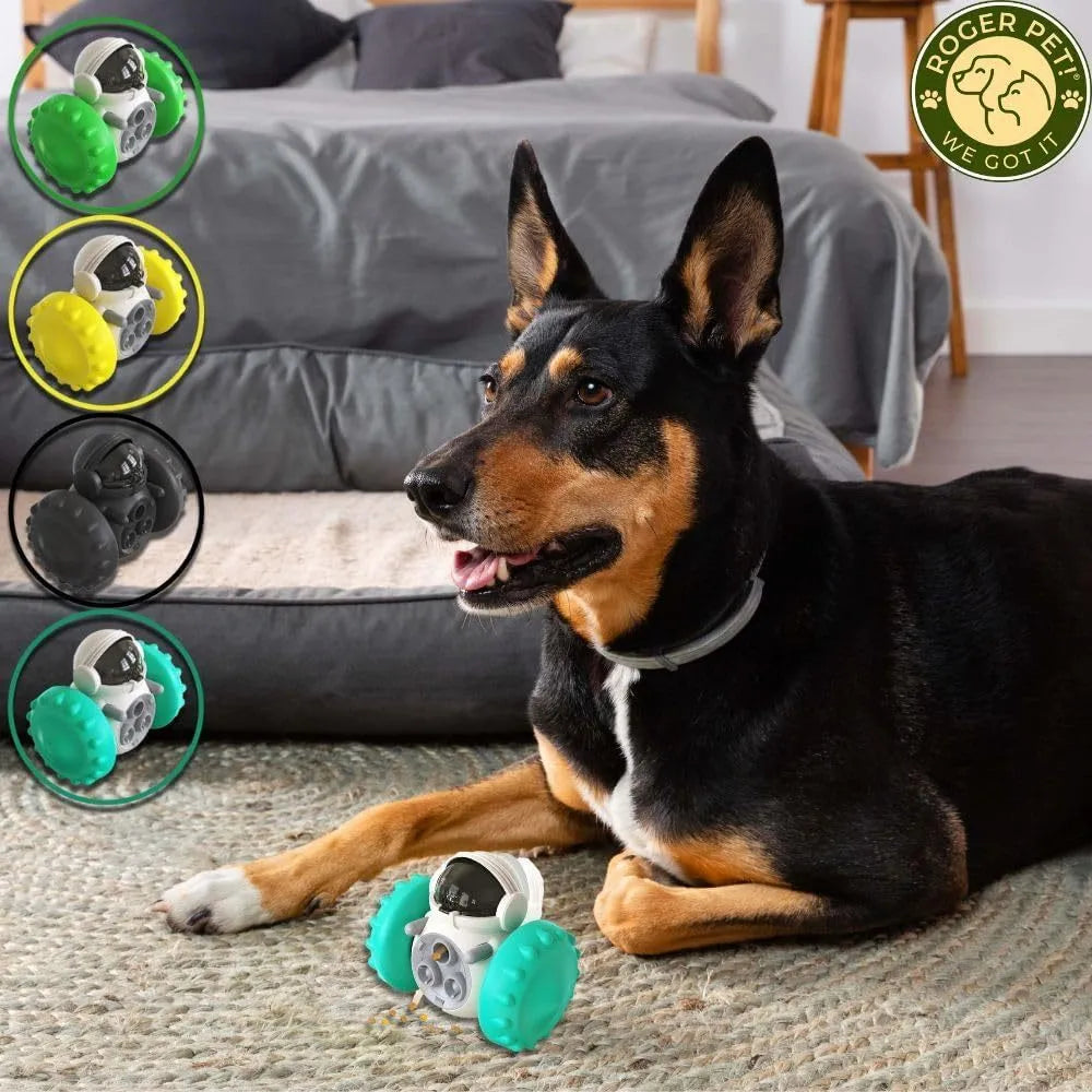 Robot-shaped self-balancing dog treat tumbler toy for small pets on a floor.