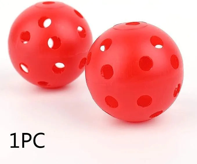 Multi-colour golf practice balls in red, orange, blue, green, white and yellow with net packaging