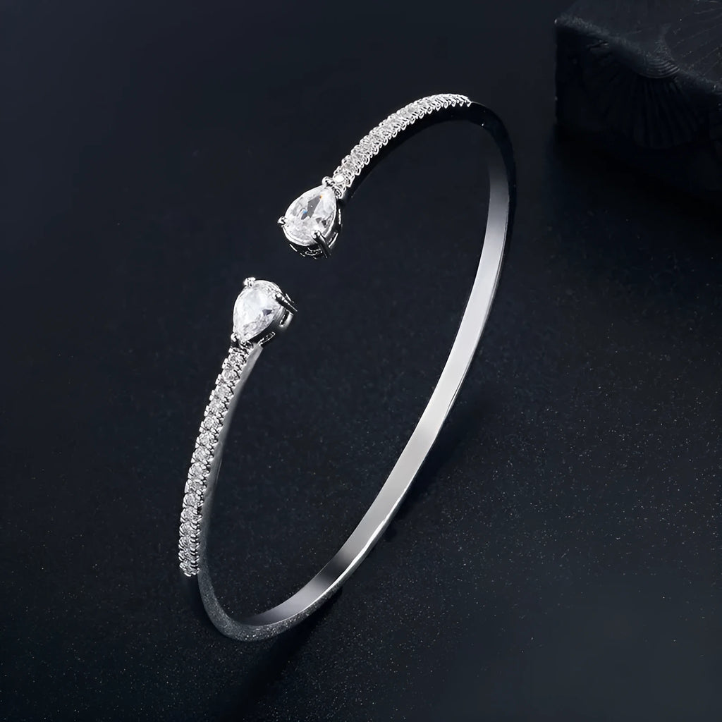 Multi-zircon personalised bracelet with inlaid detailing on copper in blue and white options