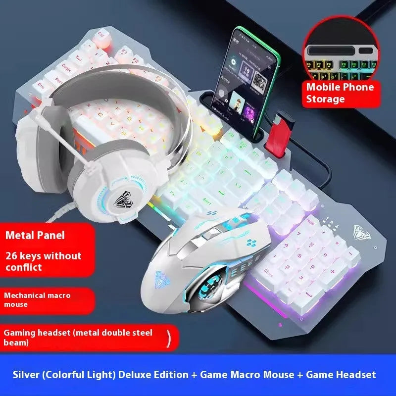 Metal gaming bundle showing mechanical keyboard with RGB lighting, matching mouse, and headset in black colour scheme