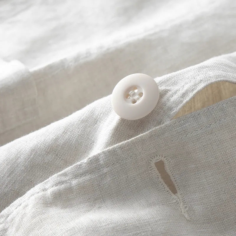 Men's loose-fit linen casual suit jacket in a solid colour, shown with long sleeves.