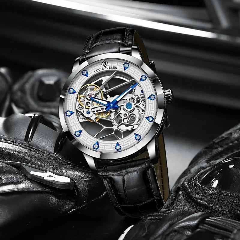 Men's silver mechanical watch with white dial, blue hands, black leather strap and butterfly buckle