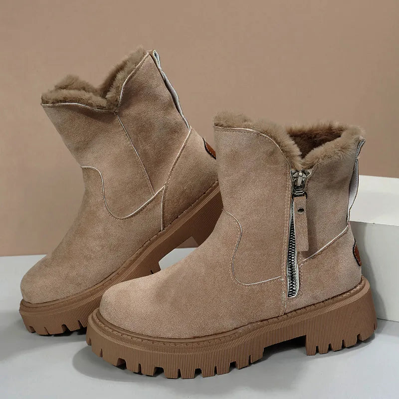 Women's black faux suede high-top snow boots with a side zipper and thick plush lining.