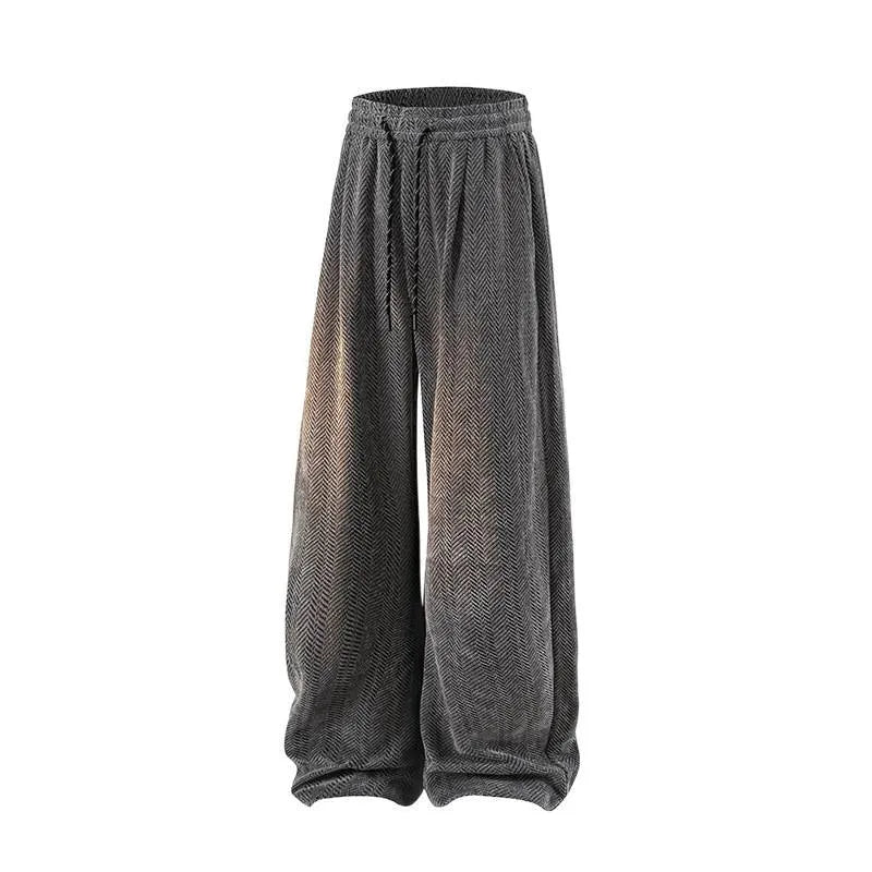 Straight-leg hollow-out trousers with elastic waist in light grey, dark grey, or black.