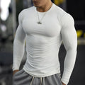 Men's black fitness tights with long sleeves and slim fit for running and exercise