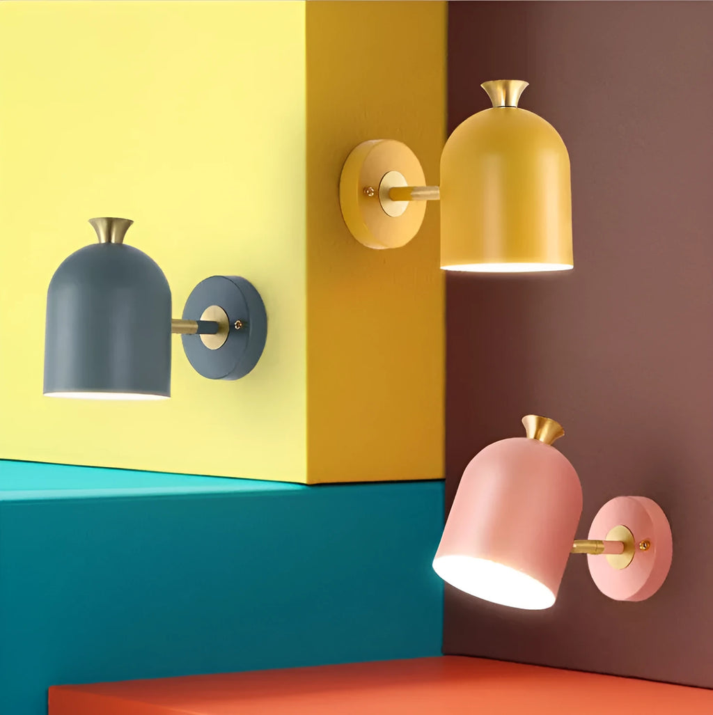 Single-head aluminium wall lamp with mirror front in choice of yellow, green, blue, or pink light.