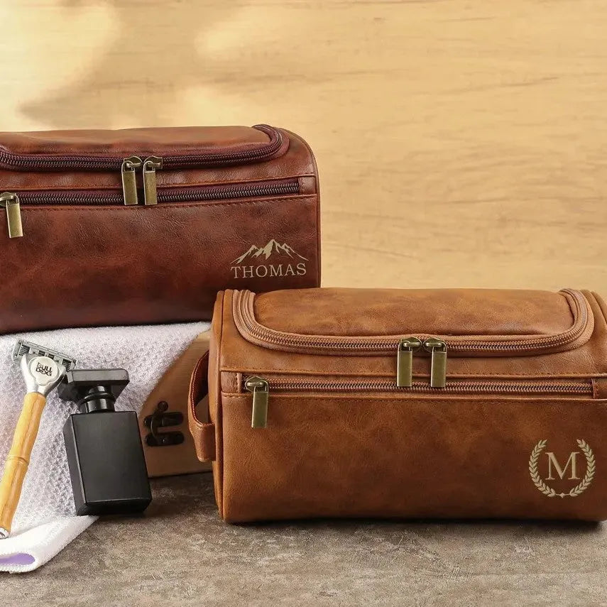 Men's black PU leather travel bag with seven interior compartments showing cosmetics section