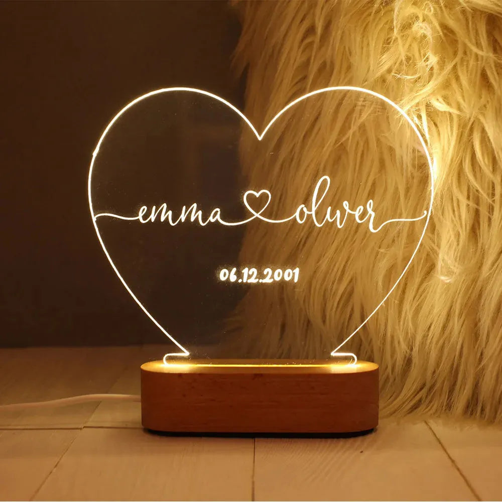 Custom acrylic LED night light displaying personalised names and date text