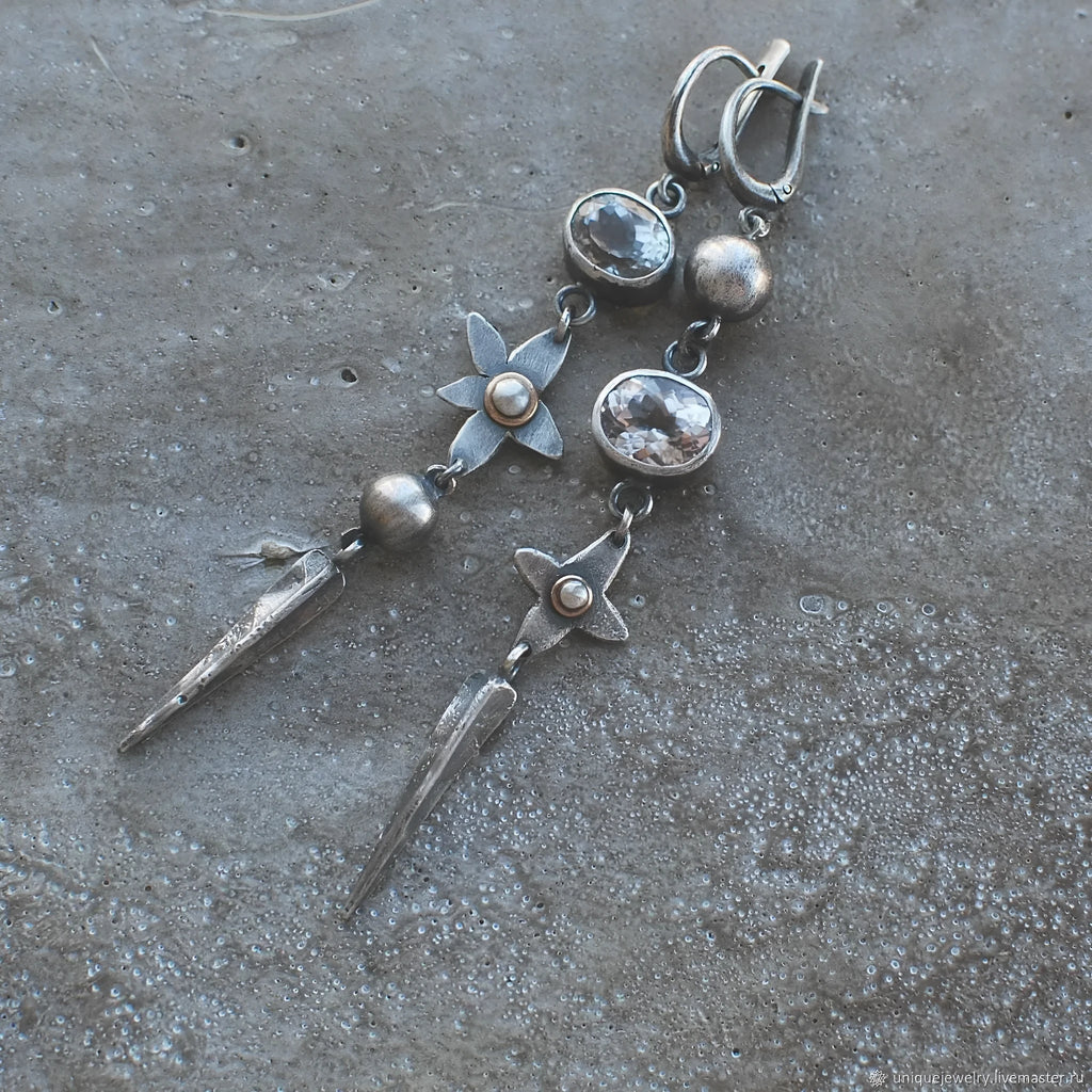 Geometric antique silver pendant earrings with XINGX rhinestone design