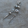 Geometric antique silver pendant earrings with XINGX rhinestone design