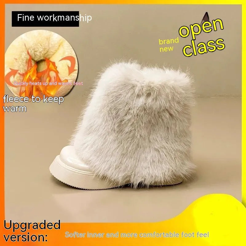 Women's black fleece-lined snow boots with a waterproof platform and round toe on a rubber sole.