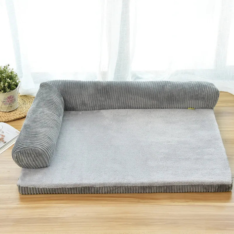 Corduroy pet sofa dog bed in grey, showing removable cover and non-slip base, placed on a hardwood floor.