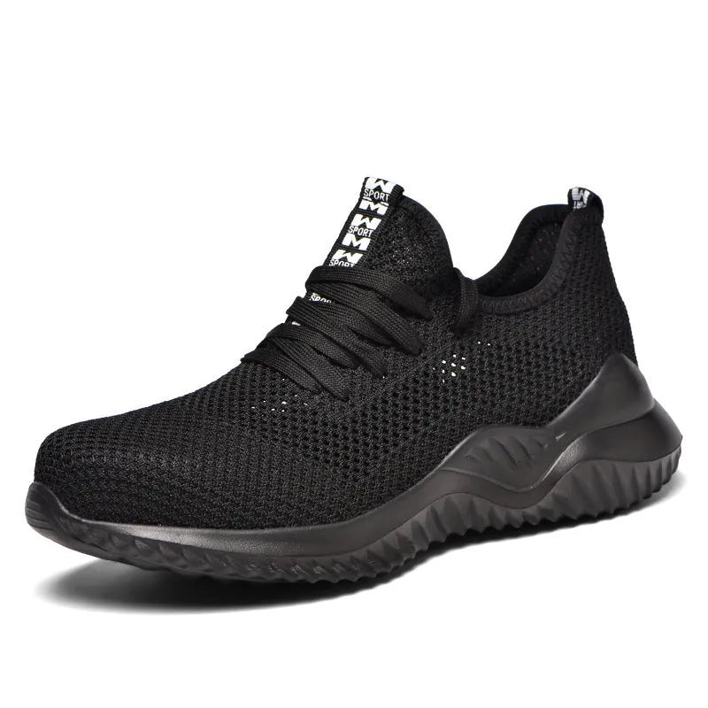 Black low-cut steel toe safety shoes with anti-static EVA sole on a work surface