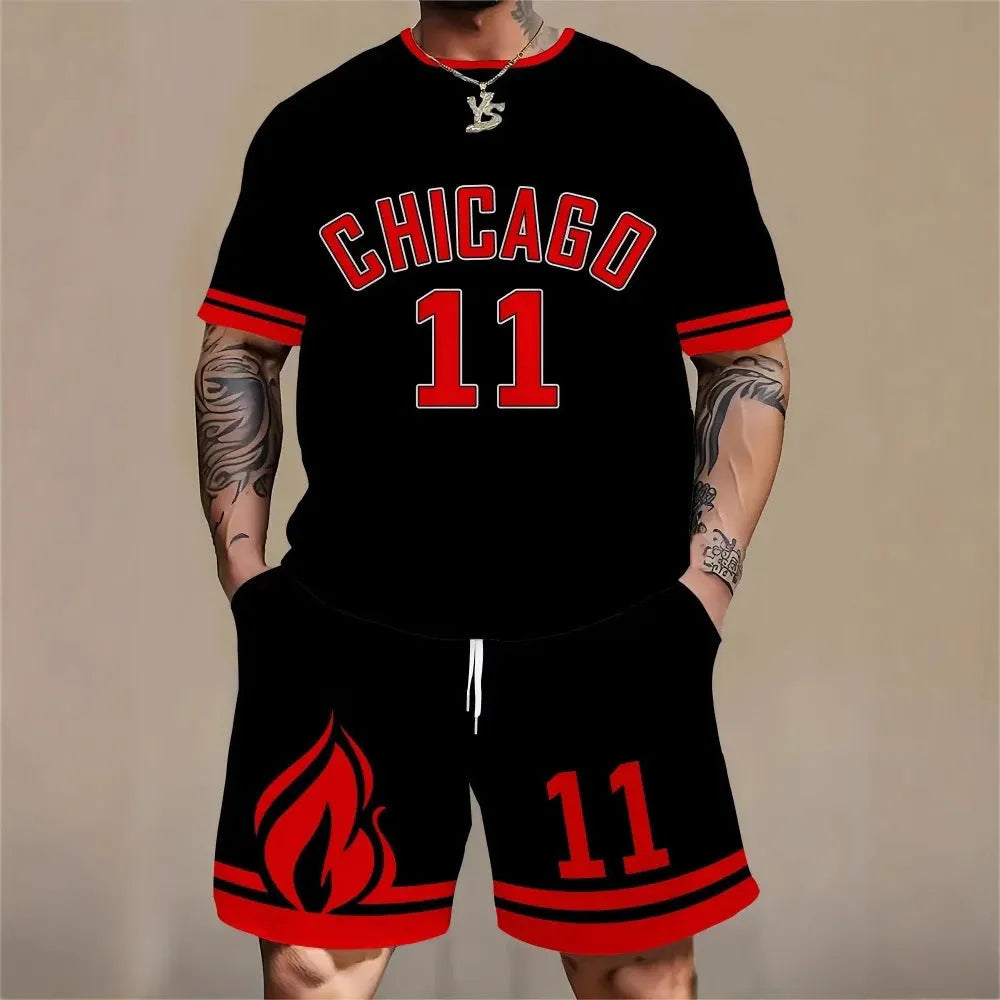 Man wearing a men's short sleeve top and shorts set with a 3D printed letter design, in a sportswear setting.