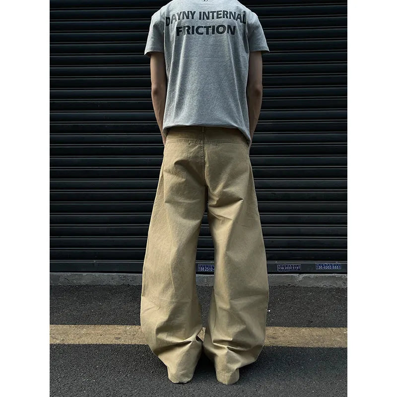 Men's khaki straight leg cotton trousers laid flat, showcasing the casual American retro style.