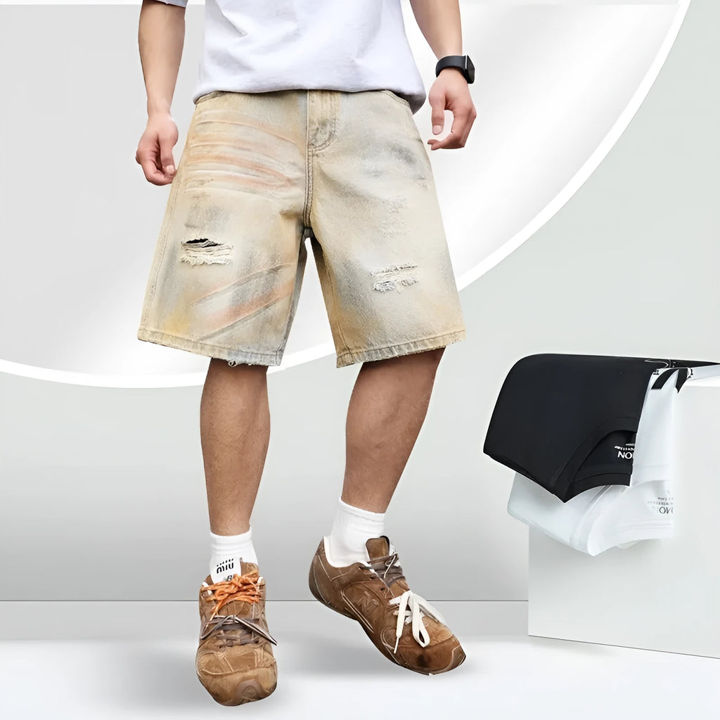 Light blue ripped denim shorts for men on a mid-thigh model, showing straight-leg cut and distressed details.