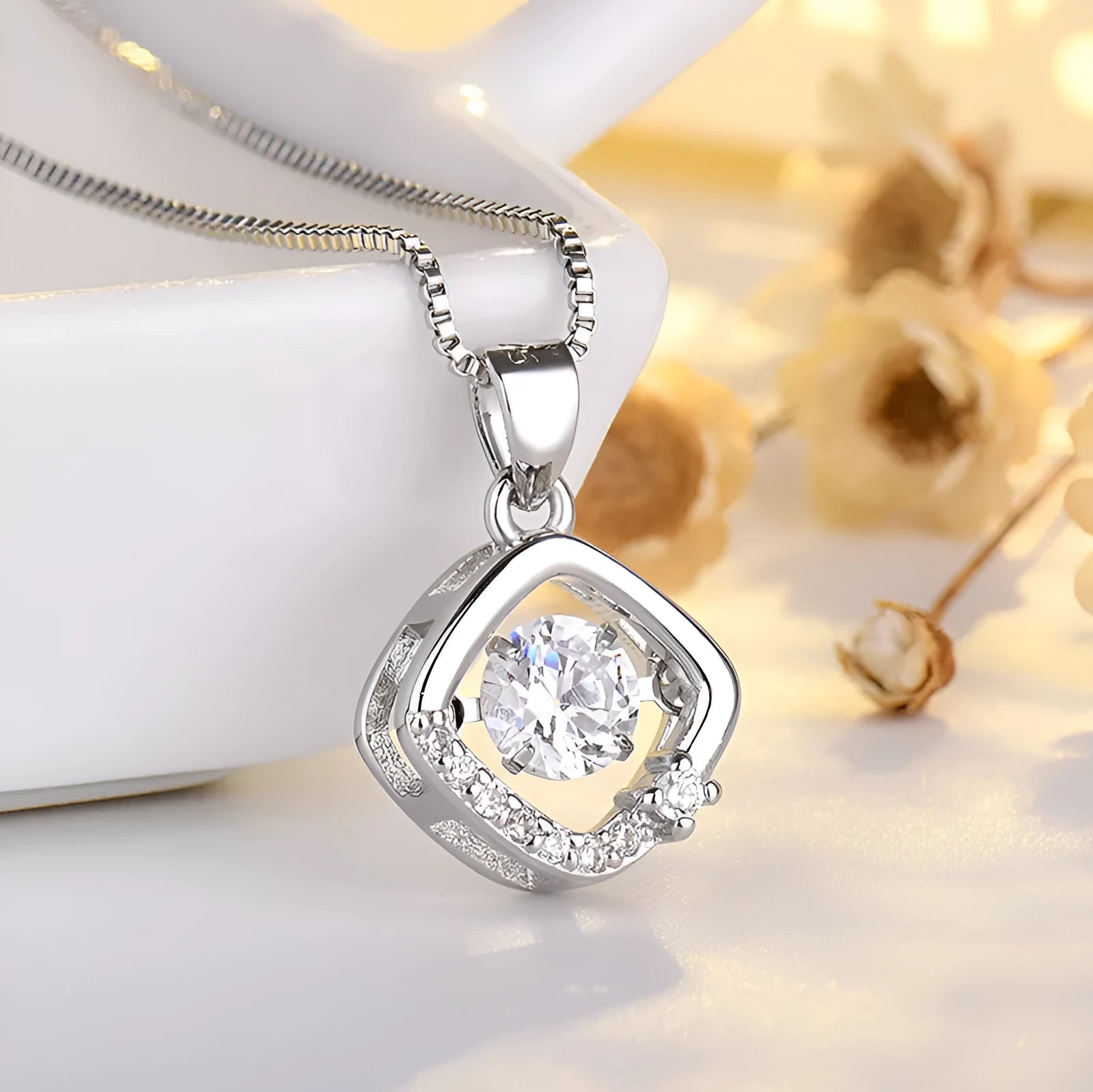 Silver or rose gold heart-shaped pendant necklace for women featuring detailed crown and bow decorations.
