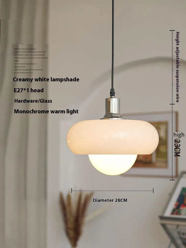 Bauhaus style three headed egg tart pendant light with glass shades in milky white finish