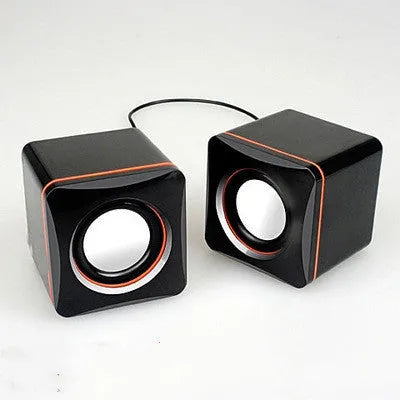 Black square USB-powered computer speaker for desktop PC audio enhancement