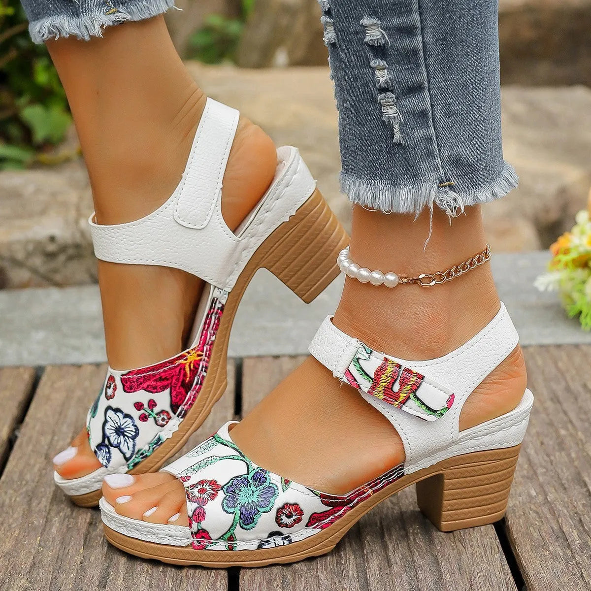 White women's high heel sandals with adjustable Velcro buckle strap on a casual rubber sole.
