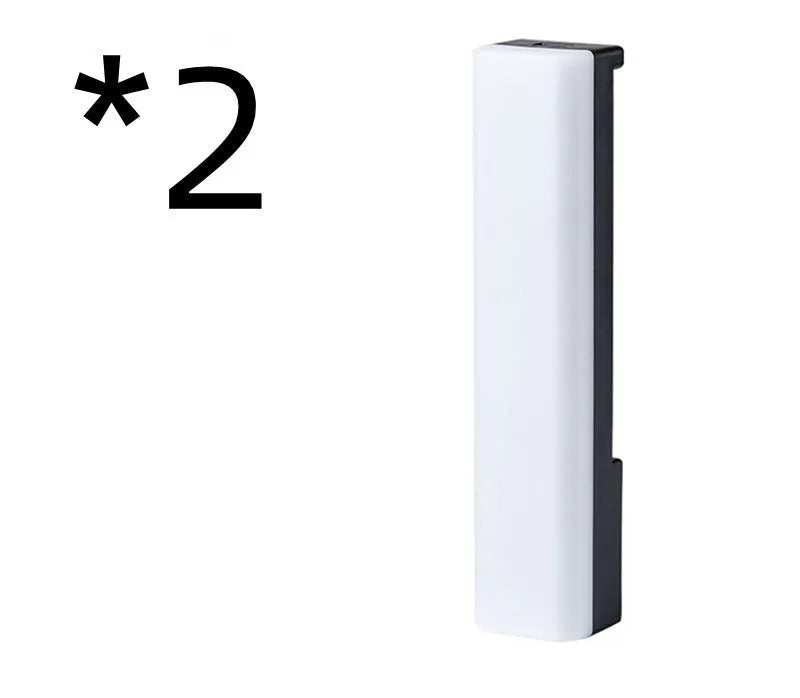 3D RGB tabletop ambiance lamp with voice-activated rhythm lights in black or white shell.