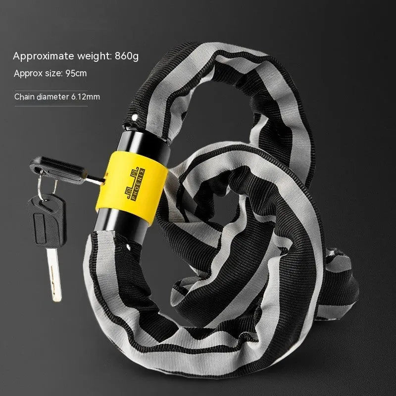 Black zinc alloy bicycle chain lock with a 95cm length shown next to a mountain bike wheel.