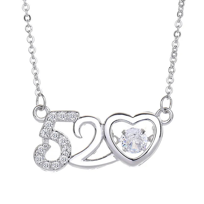 Silver or rose gold heart-shaped pendant necklace for women featuring detailed crown and bow decorations.