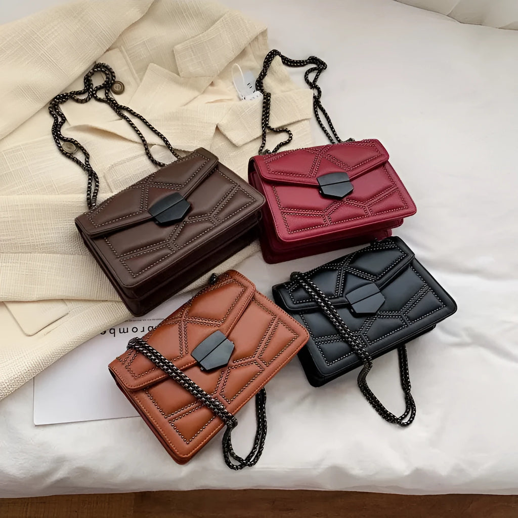Small square PU shoulder bag with gold rivet studs, chain handle and zipper closure, available in four colours