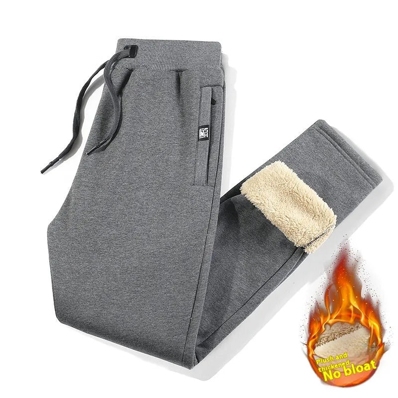 Men's grey fleece-lined cotton track pants with elastic waist and straight leg style