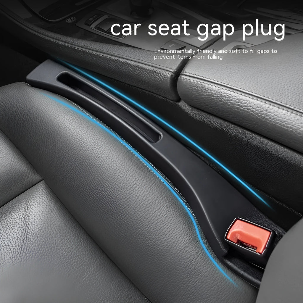 Black plastic car seats gap storage box with handle between driver seat and centre console