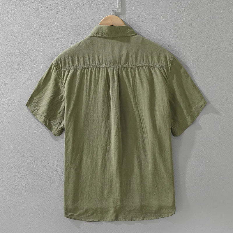 Loose casual lyocell top in cardigan style with short sleeves available in black green purple colours