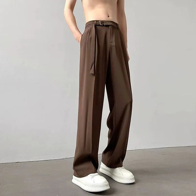 Black straight leg wide trousers with loose fit and non-iron chemical fibre fabric in solid colour.
