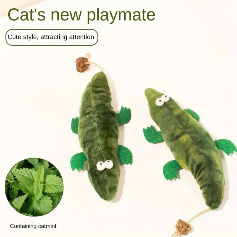 Green plush alligator catnip toy with peppermint scent for feline oral cleansing