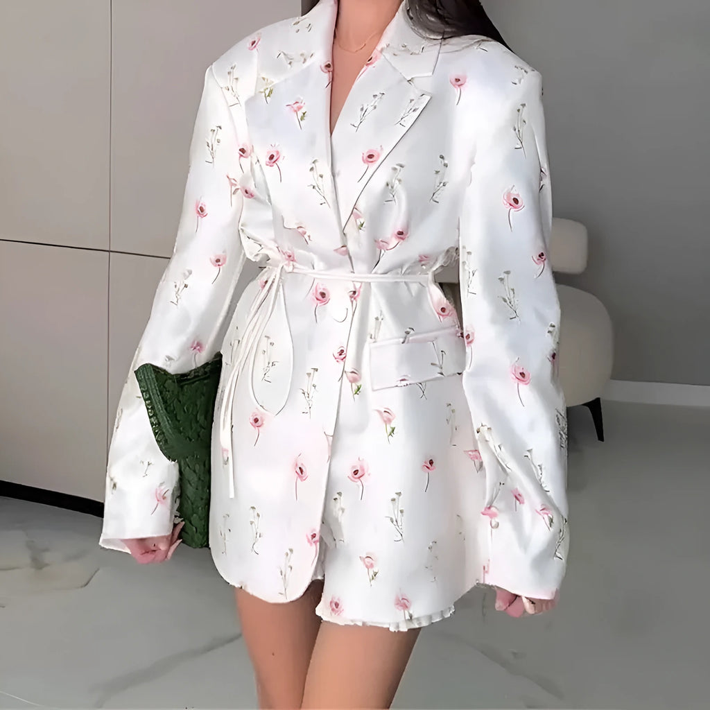 Women's floral print suit jacket with lace-up waist detail on collar, shown in apricot colour