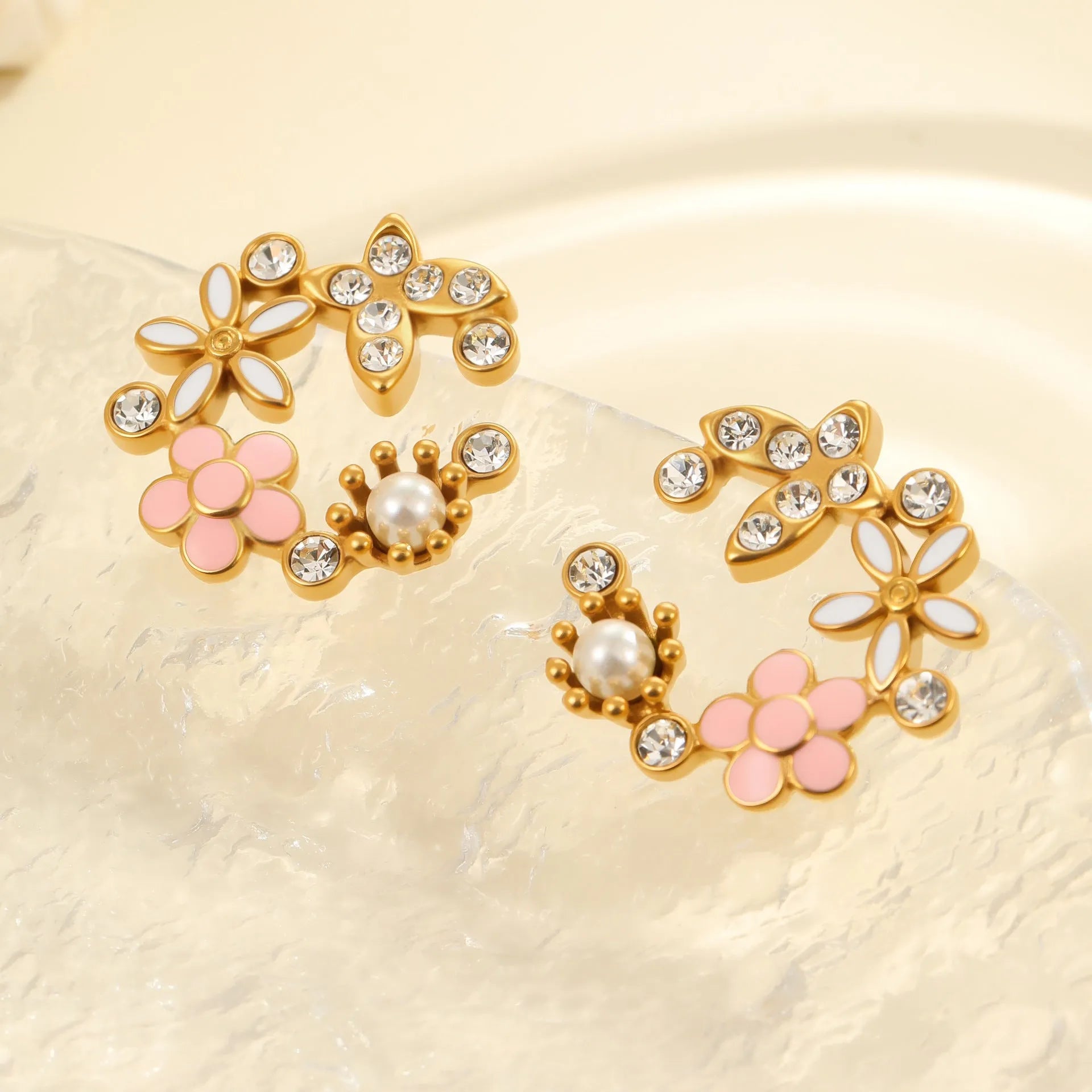 Stainless steel flower stud earrings with 18K gold electroplating and colourful petal design