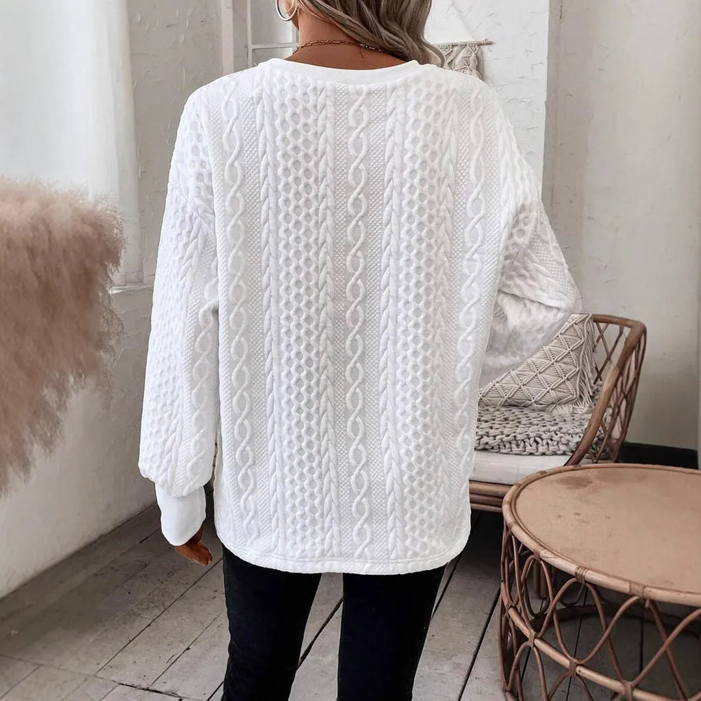 Milky white long sleeve T-shirt with 3D pattern design and loose fit silhouette