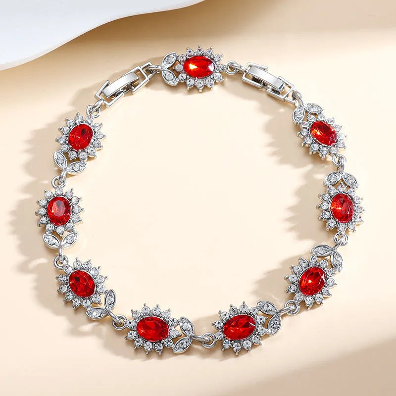 Women's simple zircon inlay bracelet in environmentally friendly alloy, shown in various gemstone-inspired colour finishes.