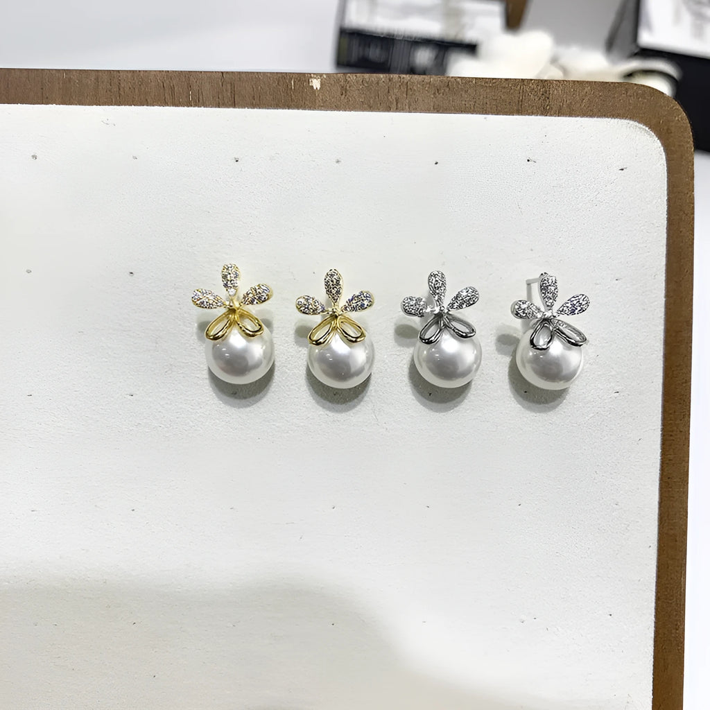 Pearl flower small fragrance earrings in gold and silver with faux pearl centres on alloy metal posts