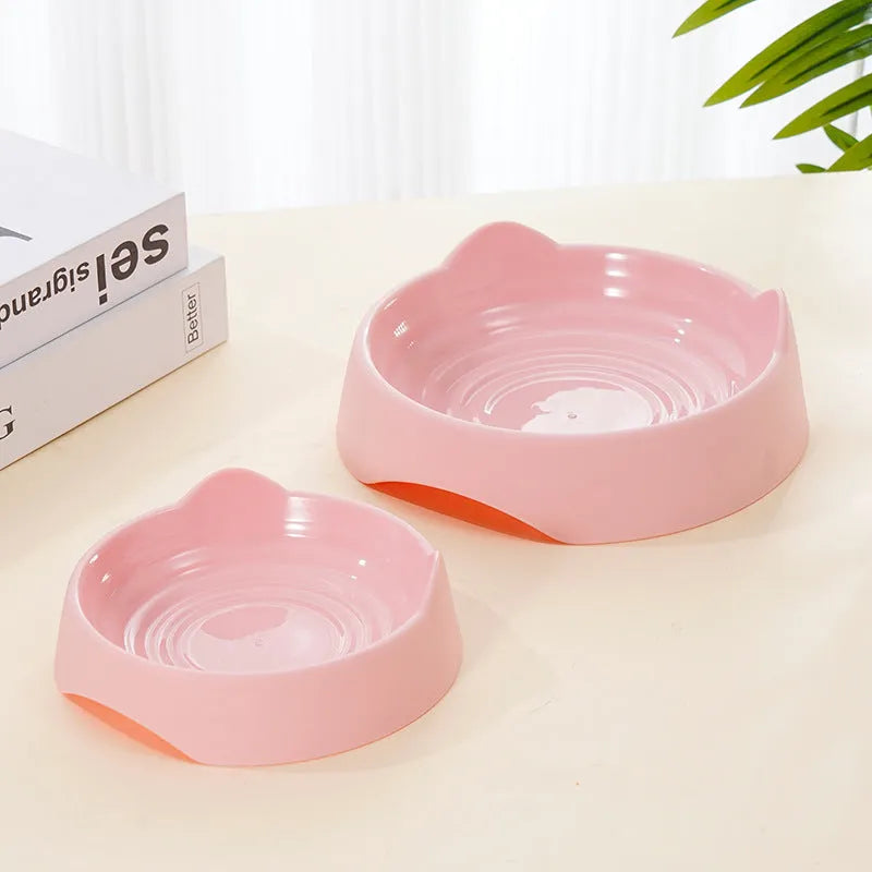 Ceramic dog slow feeder bowl with raised maze pattern in blue, green, or pink colours
