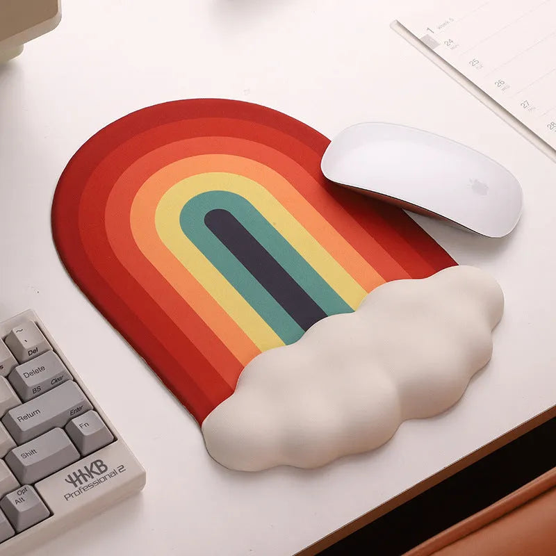 Silica gel wrister mouse pad and keyboard support set in a pastoral cloud pattern on a desk.