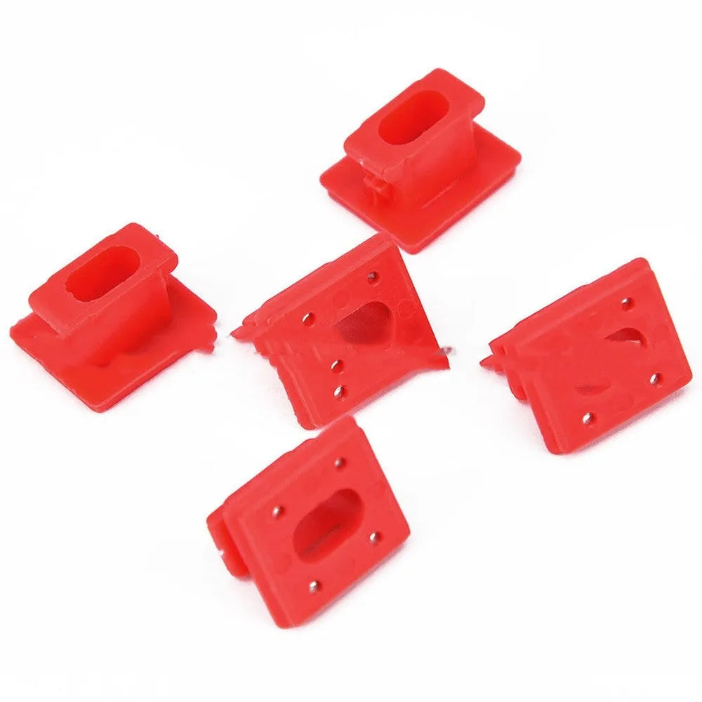 10 plastic BMW interior door trim panel repair clips and buckles on a white background