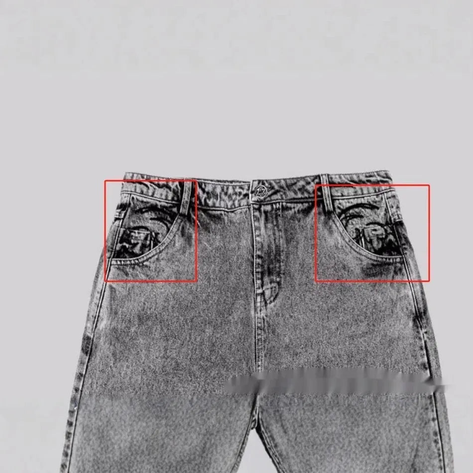Grey loose straight-leg cotton denim trousers for men and women showing mid-waist design