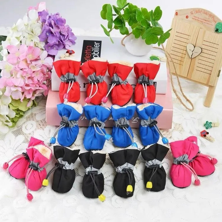 Set of four breathable cloth dog shoes with soft soles, shown in a choice of colours and patterns.