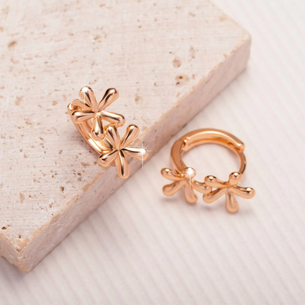 Rose gold circular earrings with waterdrop flower design for women