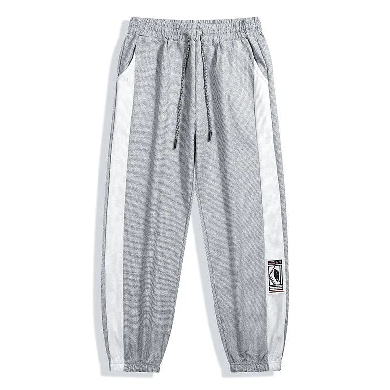 Men's casual wide leg fleece lined trousers in black, loose fit with drawstring waist
