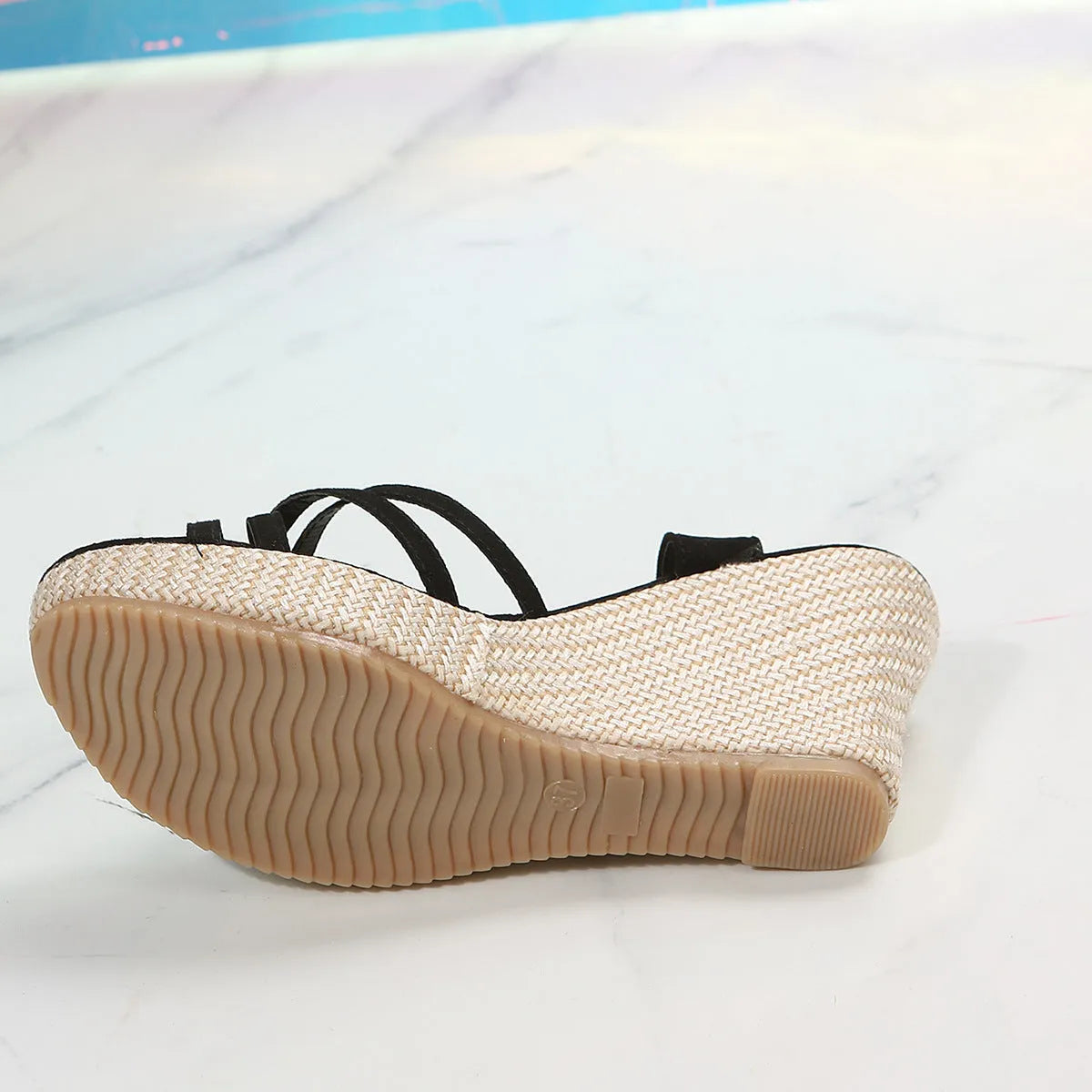 Women's wedge sandals with fish mouth toe design in black and white colour options
